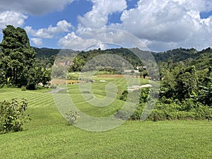 Golf hole Phuket Thailand with lake