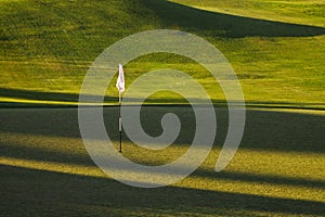 Golf hole shadows