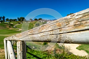 Golf at La Cala de Mijas, Spain on a sunny day with green grass and beautiful landscape. photo