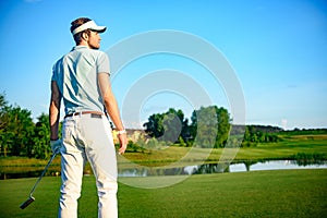 Golf player holding driver