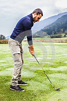 Golf player in the morning