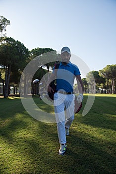 Golf player walking