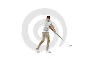 Golf player in a white shirt taking a swing isolated on white studio background