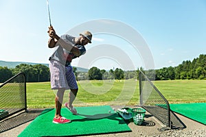 Golf Practice at the Driving Range