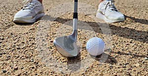 Golf shot from sand bunker golfer hitting ball from danger