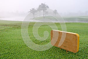 Golf sign in green golf course.