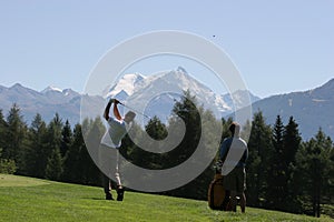 Golf swing in Crans-Montana photo