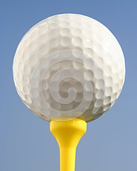 Golfball against blue sky