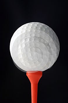 Golfball and tee
