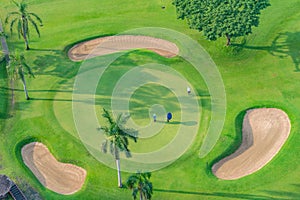 Golfcourse, Beautiful landscape of a golf court with palm trees and green grass