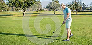 golfer in cap with golf club, copy space, sport
