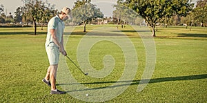 golfer in cap with golf club, copy space, sport