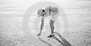 golfer in cap with golf club hold ball, sport game