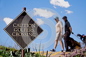 Golfer crossing