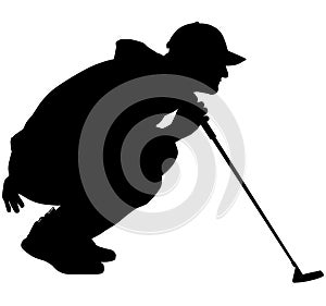 Golfer crouching on the golf course analyzing, planning the golf tee shot, golf swing with a golf club in hand. Golfer in a squat