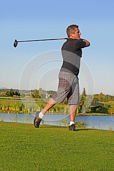 Golfer driving