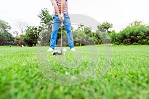 Golfer getting ready to take a shot