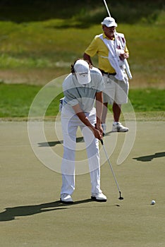 Golfer with his caddy