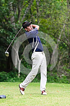 Golfer hitting a driver from the tee-box