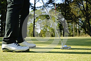 Golfer playing golf in beautiful golf course in the evening golf course with sunshine