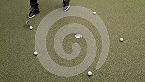 Golfer plays golf and practices short shots