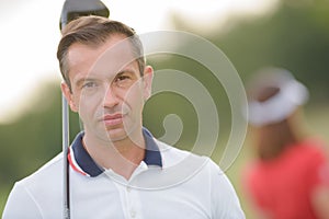 Golfer posing in golf course