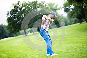 Golfer practicing and concentrating before and after shot