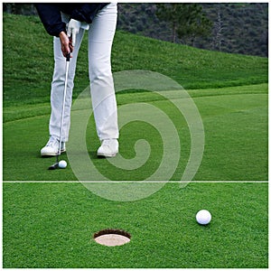 Golfer putting the ball