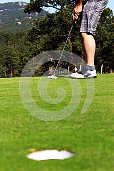 Golfer ready to putt