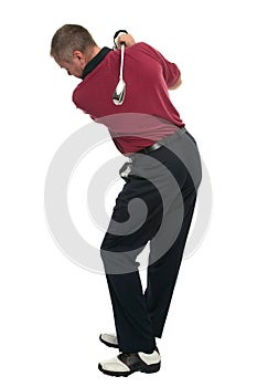 Golfer red shirt back swing