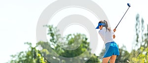 Golfer sport course golf ball fairway. People lifestyle woman playing game golf tee of on the green grass.