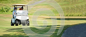 Golfer sport course golf ball on green grass. People lifestyle man and friend siting on car golf