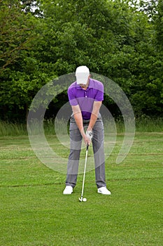 Golfer stance for a mid iron shot