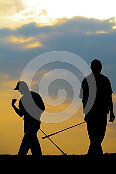 Golfer striking