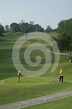 Golfer at tee-off