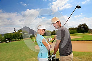 Golfers on golf course