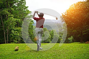 Golfers are playing golf in the evening golf course golf backglound