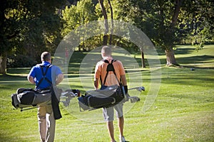 Golfers walking on the Golf Course