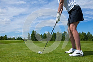 A Golfplayer with Golf ball on golf course