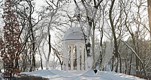 Gomel, Belarus. Gazebo Covered Snow In Snowy City Park During Sunny Winter Evening