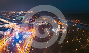 Gomel, Belarus. Main Christmas Tree And Festive Illumination On Square In Homel. New Year In Belarus. Aerial Night View photo