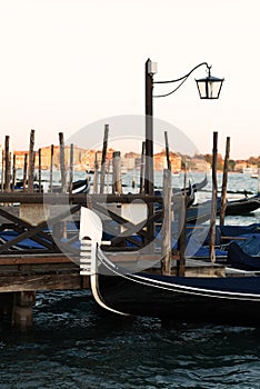 Gondola berthed on the Venetian lagoon