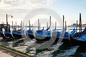 Gondola boats in Grand Canal in Venice, nobody in Italy