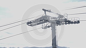 Gondola cable car ski lift mountains on background
