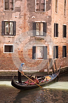 Gondola on canal in Venice, Italy