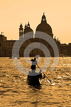 Gondola on the Grand Canal in the evening hour, Venice, Italy, E