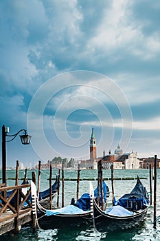 Gondola in grand canal at sunset, in venice italy