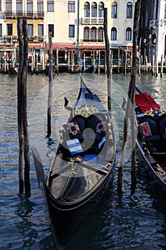 Gondola moored at the jetty ready to navigate the canals