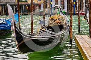 Gondola in picturesque canal in Venice Italy