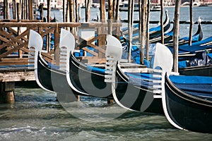 Gondola prows in Venice photo